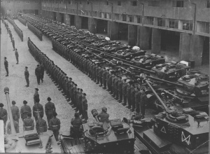 Monty inspects the Desert Rats at the Luftwaffe base in Berlin. Ted is standing in front of his 'A' Company Cromwell Tank 'Another Duffle Bag'. All 'A' Company tanks had names beginning with the letter 'A'.